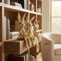Set tres conejos dorado  7,5cm* 21cm - 5,5cm* 17cm - 7,5cm* 20cm