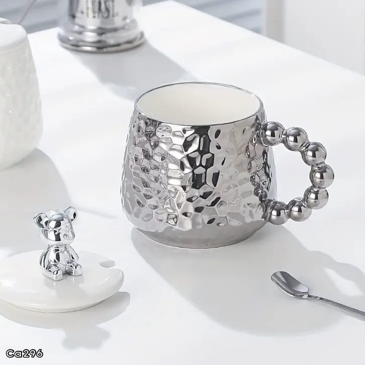 Mugs plateado ceramica detalle oso en tapa manija bolas  430ml