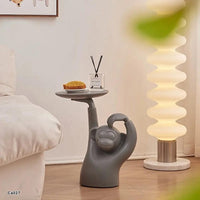 Mesa auxiliar mono gris  51cm* 19cm* 54cm