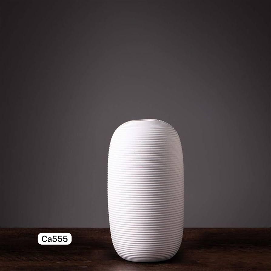 Florero moderno blanco ceramica  12cm* 12cm* 25cm