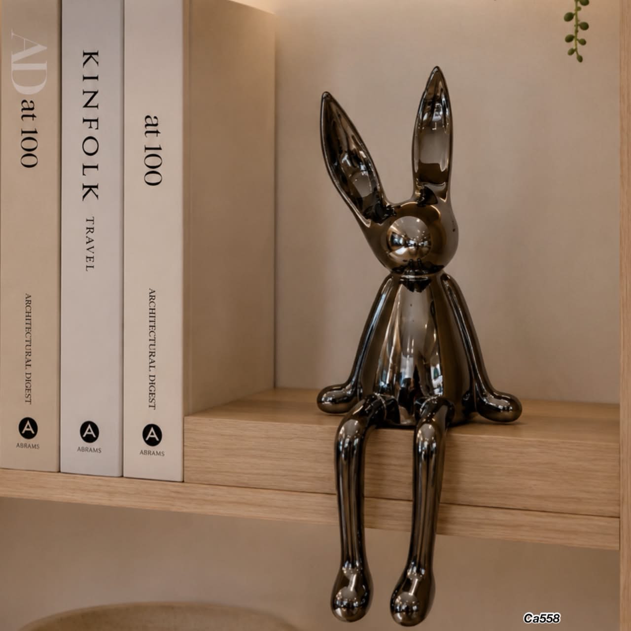 Articulo decorativo conejo plateado grande  14cm* 12cm* 36cm