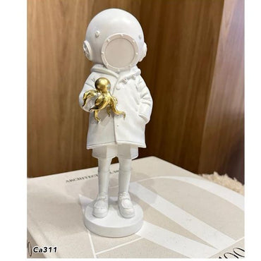 Articulo decorativo astronauta blanco pulpo dorado resina  10cm* 7,5cm* 23cm
