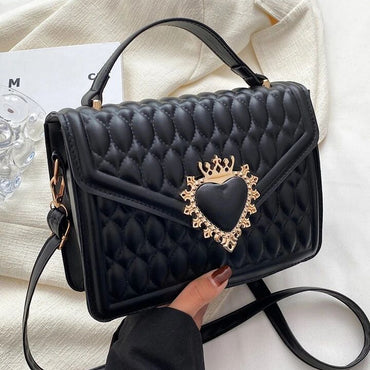 Bolso negro aplique dorado  23cm*  16cm  2012#  C-B