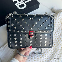 Bolso negro apliques y cadena plateado   24cm* 9cm* 18cm   C - 23196-A