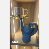 Articulo decorativo mono resina gris bandeja dorada  28,5cm* 14cm* 30cm