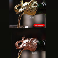 Dispensador de botellas metalico elefante plateado  10.5cm*  4cm