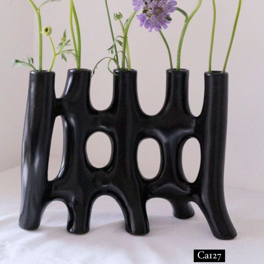 Candelabro negro ceramica  28cm* 2.5cm* 22.3