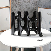 Candelabro negro ceramica  28cm* 2.5cm* 22.3