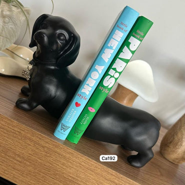Articulo decorativo perro salchicha negro cuña libros 13cm* 18cm