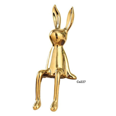 Articulo decorativo conejo dorado pequeño 8cm* 10cm* 21cm