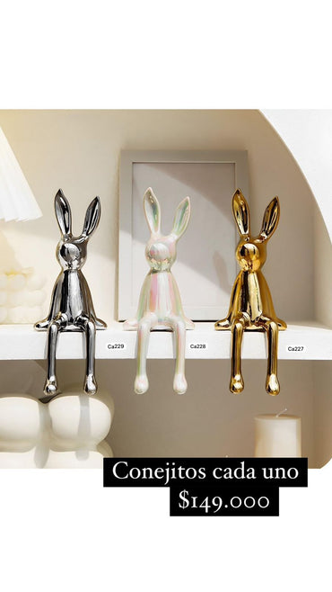 Articulo decorativo conejo dorado pequeño 8cm* 10cm* 21cm
