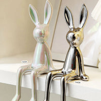 Articulo decorativo conejo plateado pequeño 8cm* 10cm* 21cm