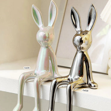 Articulo decorativo conejo plateado pequeño 8cm* 10cm* 21cm