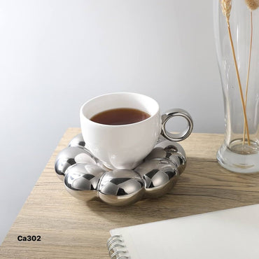 Taza plato burbuja plateado-blanco ceramica