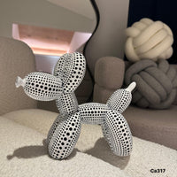 Articulo decorativo perro blanco globo resina 18cm* 9cm* 20cm