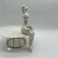 Articulo decorativo conejo blanco piernas cruzadas detalle bola cristal  5,3* 9,3* 19,8cm