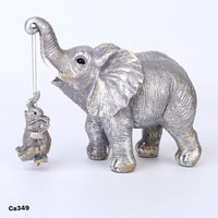Articulo decorativo elefantes plateado cuerda dorado 16cm* 8cm* 14,5cm