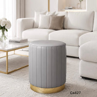 Mesa auxiliar gris claro policuero base dorado   33cm* 40cm