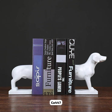 Articulo decorativo perro blanco cuña libros  18cm* 26.5cm* 12.5cm