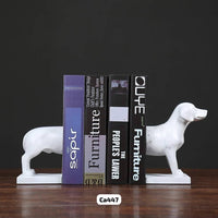Articulo decorativo perro blanco cuña libros  18cm* 26.5cm* 12.5cm