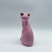 Articulo decorativo gato rosado sentado  9cm* 5cm* 14cm