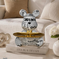Articulo decorativo oso blanco detalles negro bandeja dorado  23cm* 19cm* 23cm