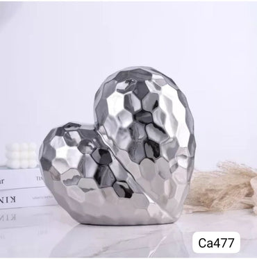 Articulo decorativo corazon plateado  19cm* 9,5cm* 19cm