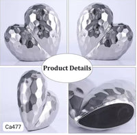 Articulo decorativo corazon plateado  19cm* 9,5cm* 19cm