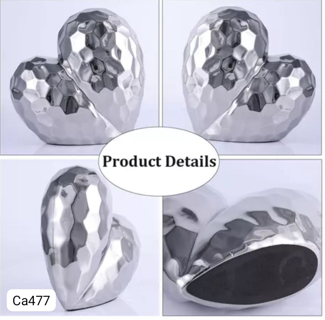 Articulo decorativo corazon plateado  19cm* 9,5cm* 19cm