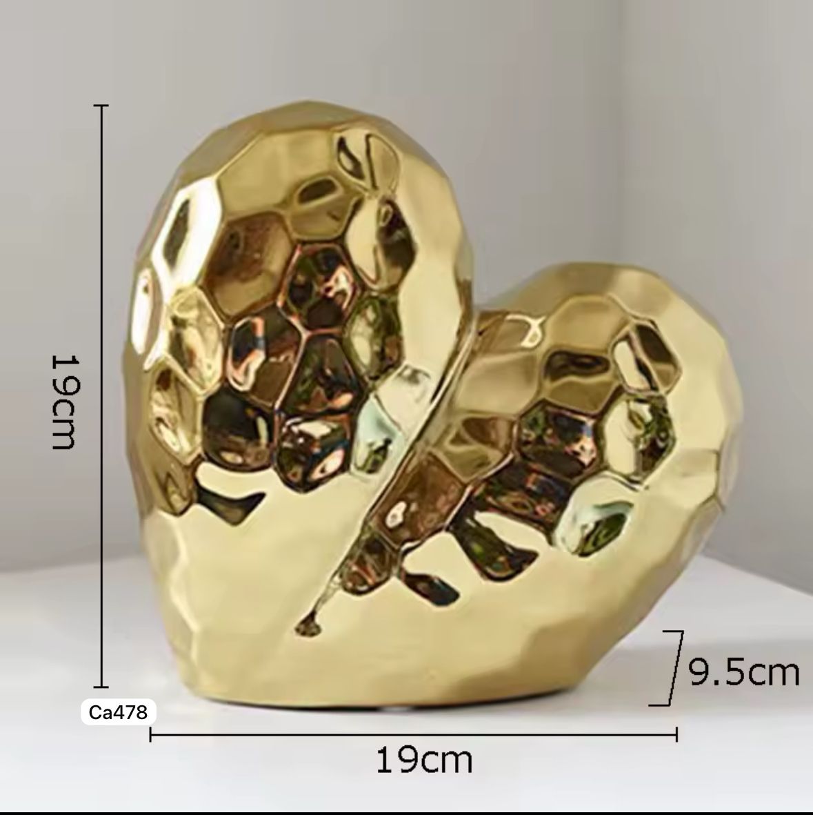 Articulo decorativo corazon dorado  19cm* 9,5cm* 19cm
