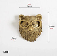 Articulo decorativo oso dorado de pared  16,5cm* 14,5cm