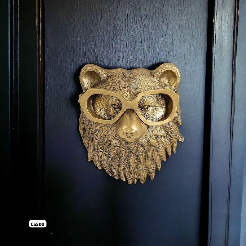 Articulo decorativo oso dorado de pared  16,5cm* 14,5cm