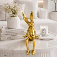 Articulo decorativo conejo dorado grande  14cm* 12cm* 36cm