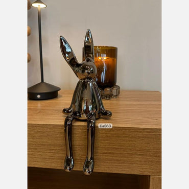 Articulo decorativo conejo plateado oscuro mediano  10cm* 10cm* 28cm