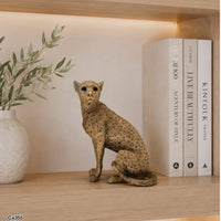 Articulo decorativo leopardo dorado sentado  13cm* 8,5cm* 15,5cm