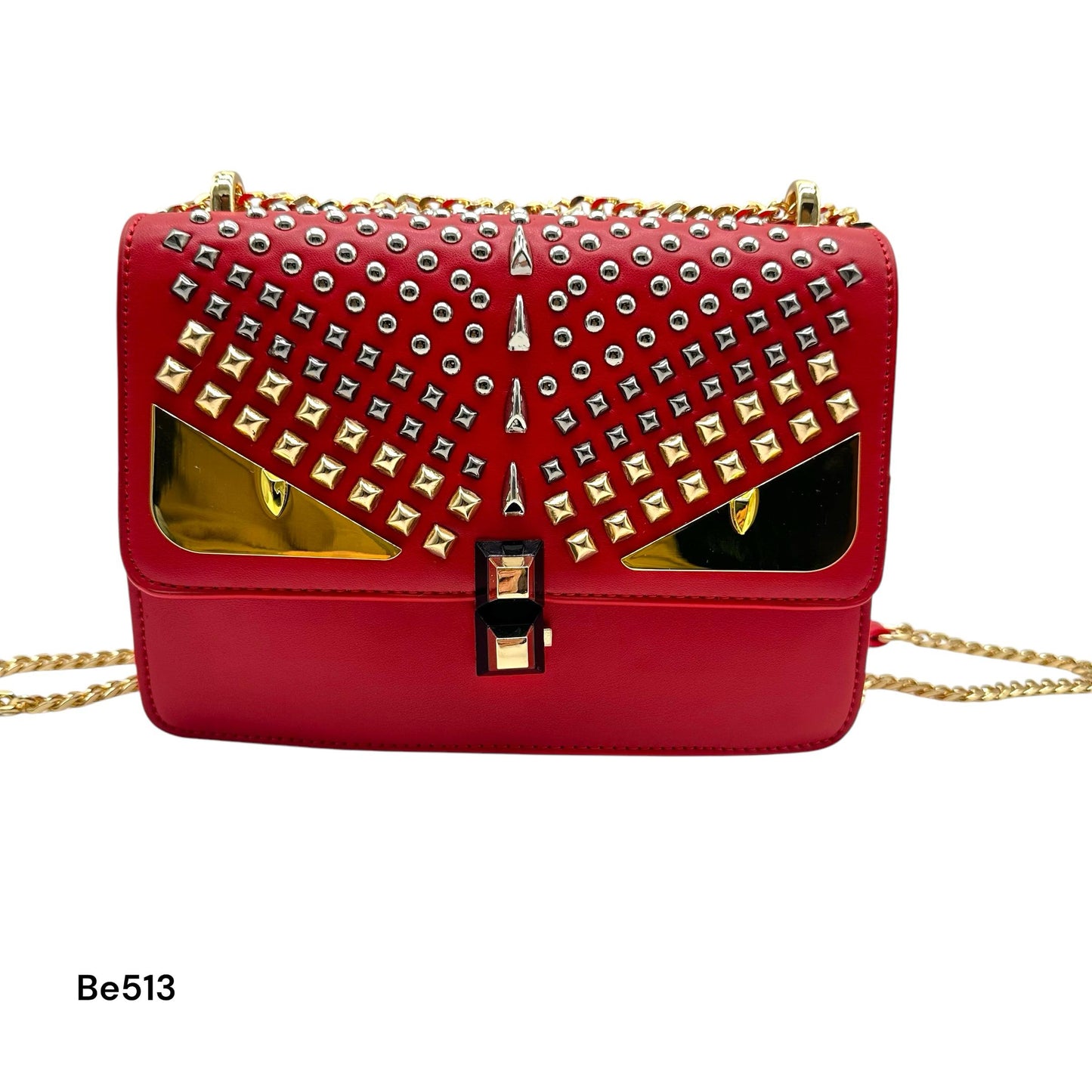 Bolso rojo apliques plateado ojos y cadena dorado  22cm* 9cm* 17cm  C- 23196-1