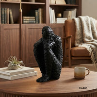 Articulo decorativo figura humano negro resina  8cm* 11cm* 20cm