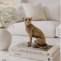 Articulo decorativo leopardo dorado sentado  13cm* 8,5cm* 15,5cm