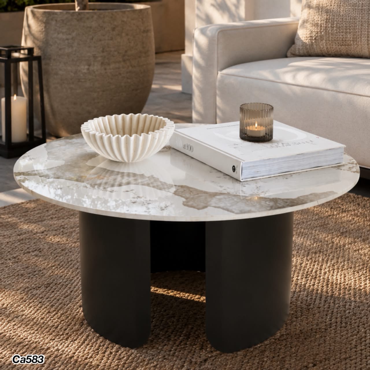 Mesa de centro piedra blanco con betas base metal negro    80cm* 40cm