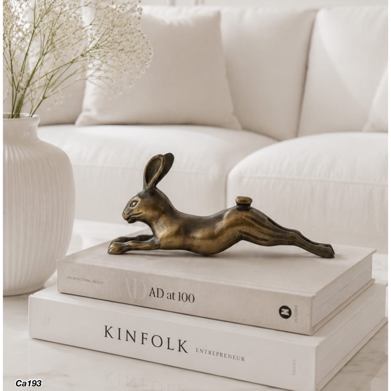 Articulo decorativo conejo en metal dorado 13cm* 7cm* 28cm