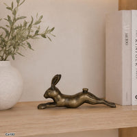Articulo decorativo conejo en metal dorado 13cm* 7cm* 28cm