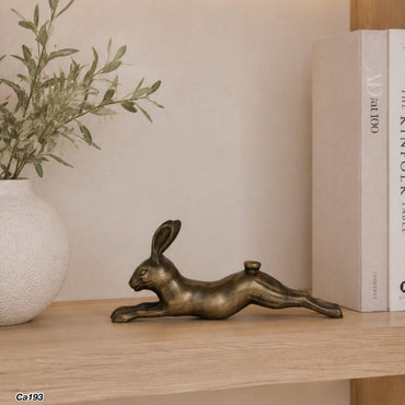 Articulo decorativo conejo en metal dorado 13cm* 7cm* 28cm